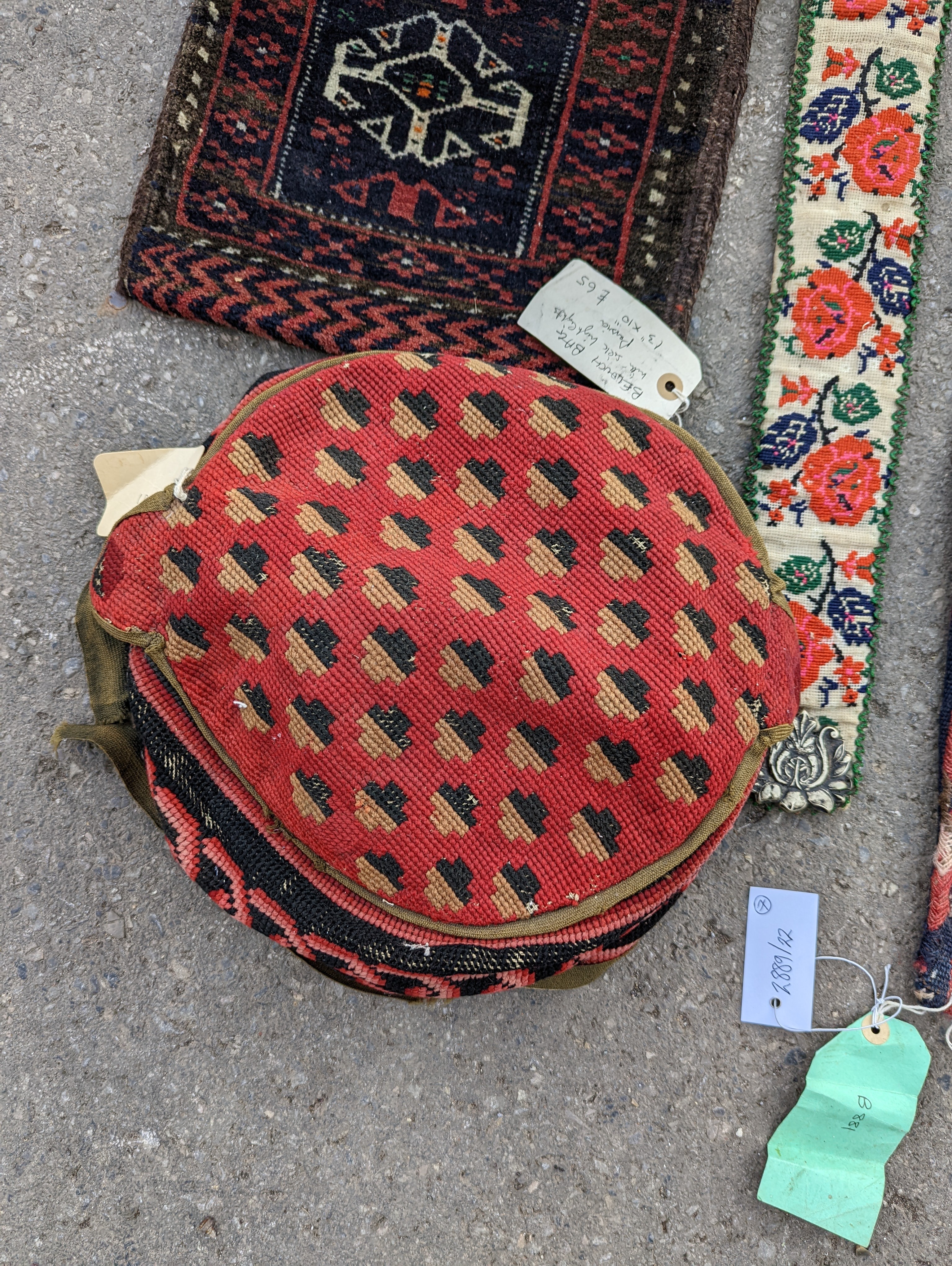 An Afghan Kilim flatweave saddlebag, 144 x 69cm together with six assorted bags, faces, etc.